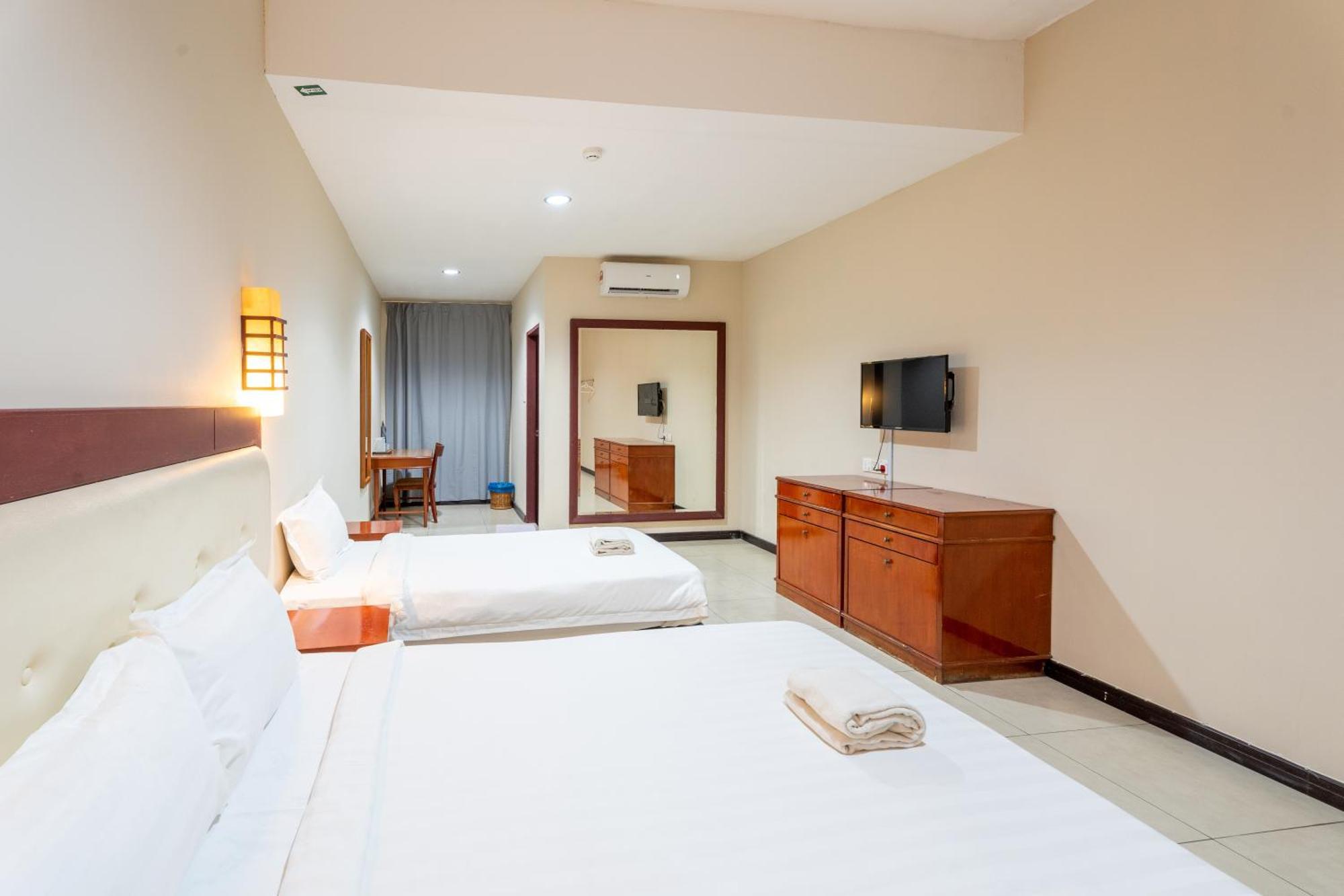Pertama Lodge Тавау Стая снимка