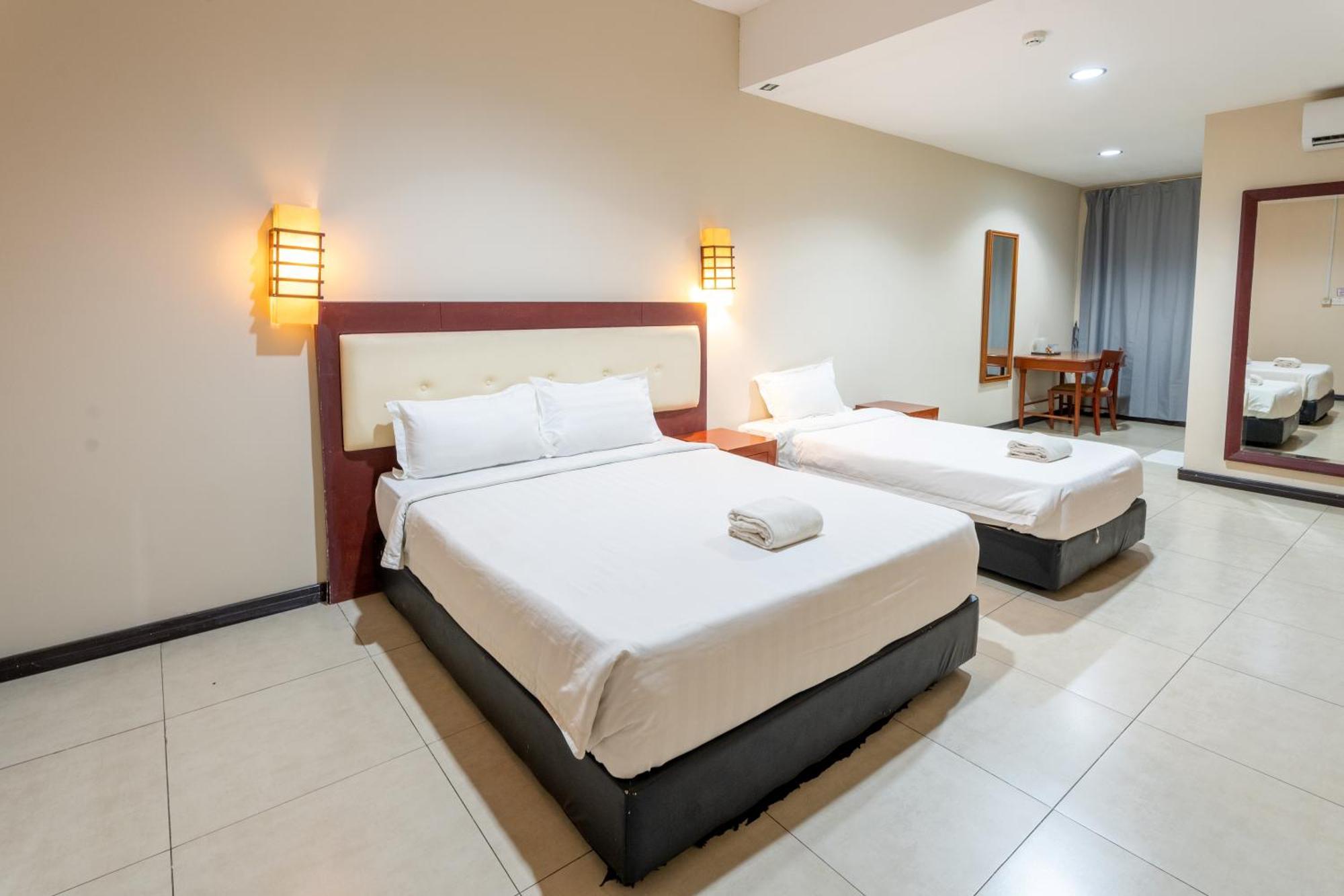 Pertama Lodge Тавау Стая снимка